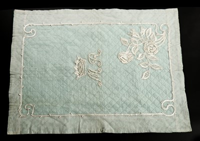 Lot 454 - A whitework embroidered tulle and quilted blue...