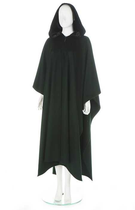 Lot 213 - An Yves Saint Laurent dark green wool cape,...