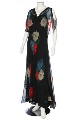 Lot 216 - Four floral printed evening gowns, 1930s,...