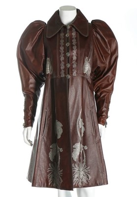 Lot 306 - A Bill Gibb brown leather coat, Autumn-Winter,...