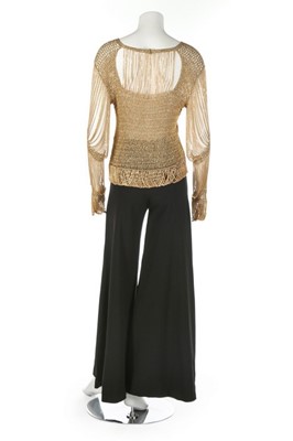Lot 372 - A Loris Azzaro gold crochet and chain fringed...