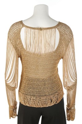 Lot 372 - A Loris Azzaro gold crochet and chain fringed...