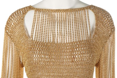 Lot 372 - A Loris Azzaro gold crochet and chain fringed...