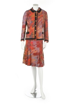 Lot 375 - A Chanel couture boucle wool suit, 1972, wide...