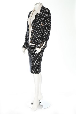 Lot 376 - A Chanel couture knitted silk polka dot suit,...