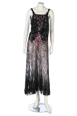 Lot 236 - A bias-cut sequinned tulle evening gown, early...