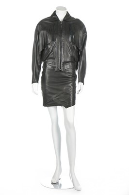 Lot 88 - A Gianni Versace black leather suit, circa...