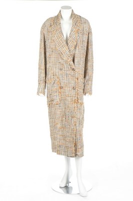 Lot 90 - A Chanel boutique tweed summer coat, 1998,...