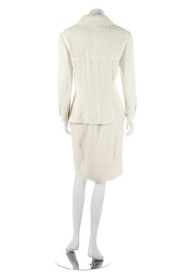 Lot 154 - A Chanel white tweed suit, late 1990s,...