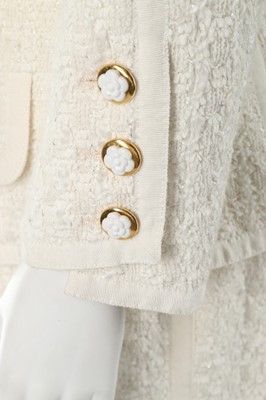 Lot 154 - A Chanel white tweed suit, late 1990s,...
