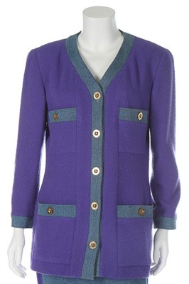 Lot 155 - A Chanel purple tweed and denim suit, 1990s,...