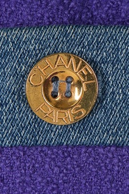 Lot 155 - A Chanel purple tweed and denim suit, 1990s,...