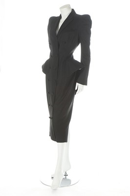 Lot 237 - A John Galliano black gabardine coat/dress,...