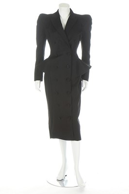Lot 237 - A John Galliano black gabardine coat/dress,...