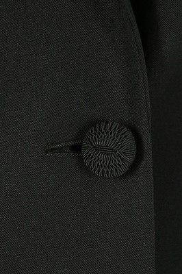 Lot 237 - A John Galliano black gabardine coat/dress,...