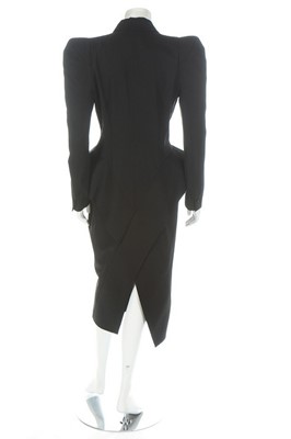 Lot 237 - A John Galliano black gabardine coat/dress,...