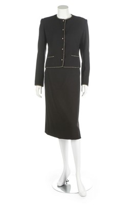 Lot 359 - A Chanel Creations black wool suit and tweed...