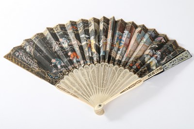 Lot 84 - Two Chinese fans, one with chicken skin leaf...