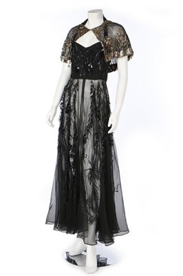Lot 40 - A sequinned organza evening gown, possibly...