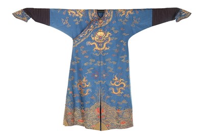 Lot 427 - An embroidered blue silk taffeta dragon robe,...