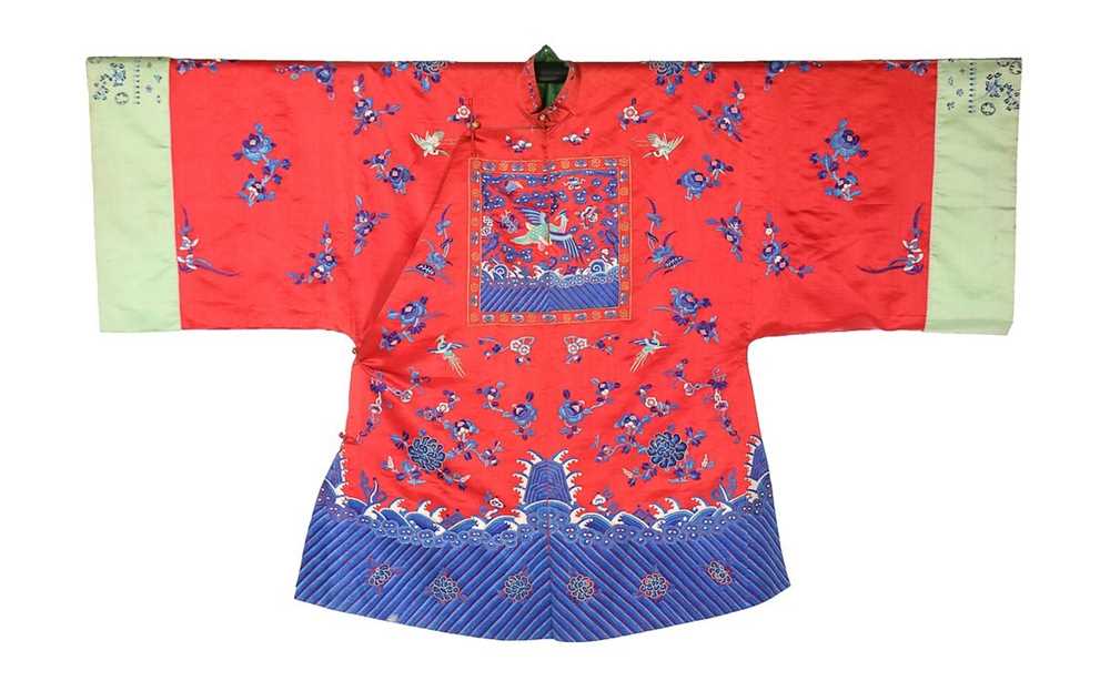 Lot 421 - A woman's embroidered red silk robe, Chinese,
