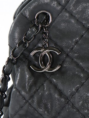 Lot 2 - A Chanel dark grey leather shoulder bag,...