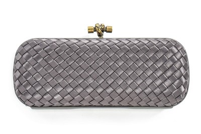 Lot 3 - A Bottega Veneta grey ribbon clutch, modern,...