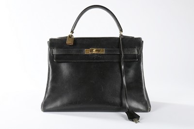 Lot 74 - An Hermès black leather Kelly bag, 1950s-60s,...