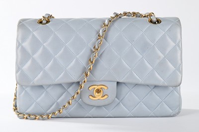 Lot 87 - A Chanel powder-blue leather 2.55 handbag,...