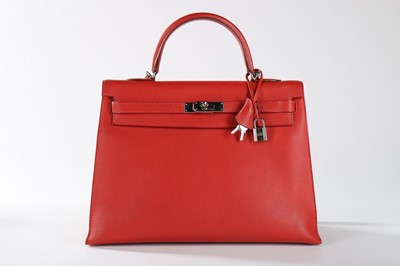 Lot 204 - An Hermès red Fjord leather Kelly bag, 2004,...