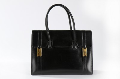 Lot 357 - An Hermès black leather Drag bag, 1960s,...