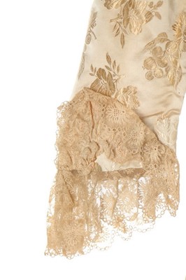 Lot 301 - An ivory damask satin wedding dress, late...