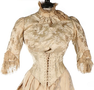 Lot 301 - An ivory damask satin wedding dress, late...