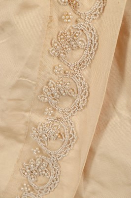 Lot 301 - An ivory damask satin wedding dress, late...
