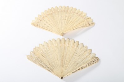 Lot 85 - Four pierced bone or sandalwood fans, circa...