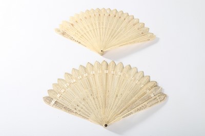 Lot 85 - Four pierced bone or sandalwood fans, circa...