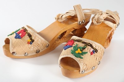 Lot 206 - A pair of Hawaiian carved wooden wedge sandals,...