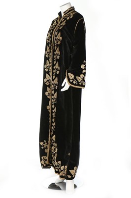 Lot 405 - An gold embroidered black velvet robe, Ottoman,...