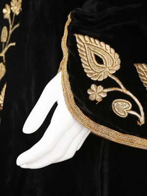 Lot 405 - An gold embroidered black velvet robe, Ottoman,...