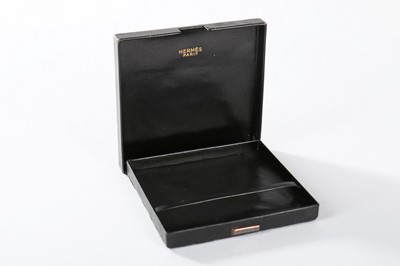 Lot 75 - An Hermès black leather cigarette case,...