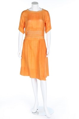 Lot 13 - A Paquin couture orange muslin smock-style...