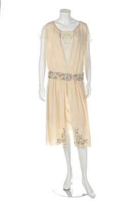 Lot 36 - A beaded ivory crpe de chine bridal gown,...