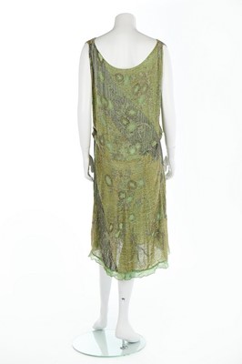 Lot 66 - A beaded green chiffon flapper dress, late...