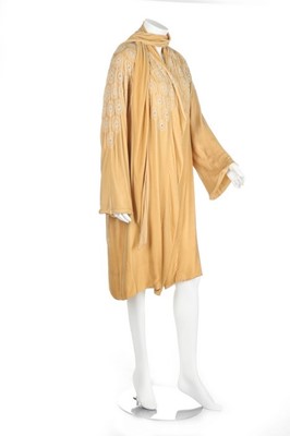 Lot 117 - A pearl beaded evening coat, late 1920s, of...