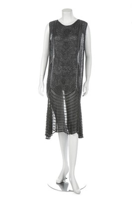 Lot 146 - A black chiffon beaded flapper dress, French,...