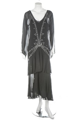 Lot 147 - A black chiffon beaded dress, mid 1920s,...