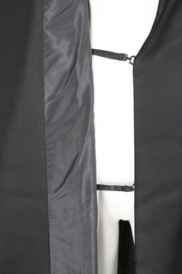 Lot 130 - A Balenciaga couture black silk faille coat,...