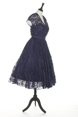 Lot 121 - A Robert Piguet couture blue lace cocktail...