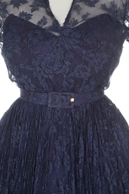 Lot 121 - A Robert Piguet couture blue lace cocktail...