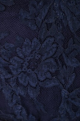 Lot 121 - A Robert Piguet couture blue lace cocktail...